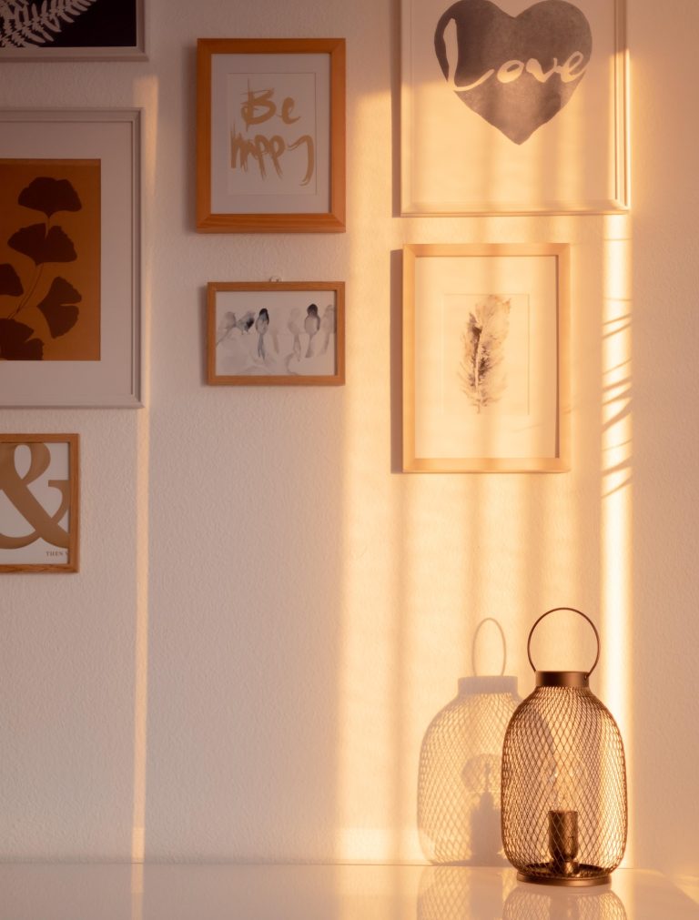 Warm gallery wall with framed art in a luxury Middle Tennessee home